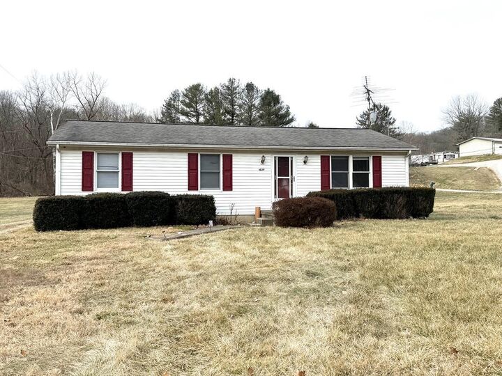 Property Photo:  1629 Possum Hollow  OH 45601 