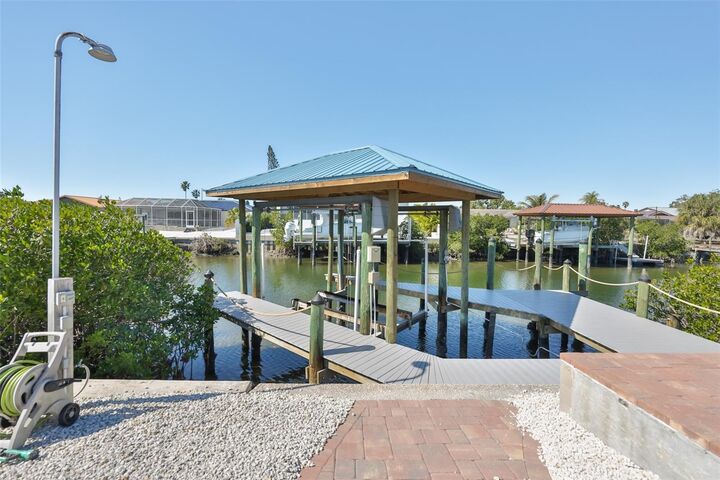 Property Photo:  6518 Senegal Palm Way  FL 33572 