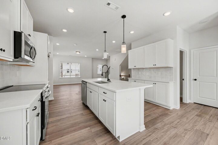 Property Photo:  720 Orchard Vista Circle  NC 27606 