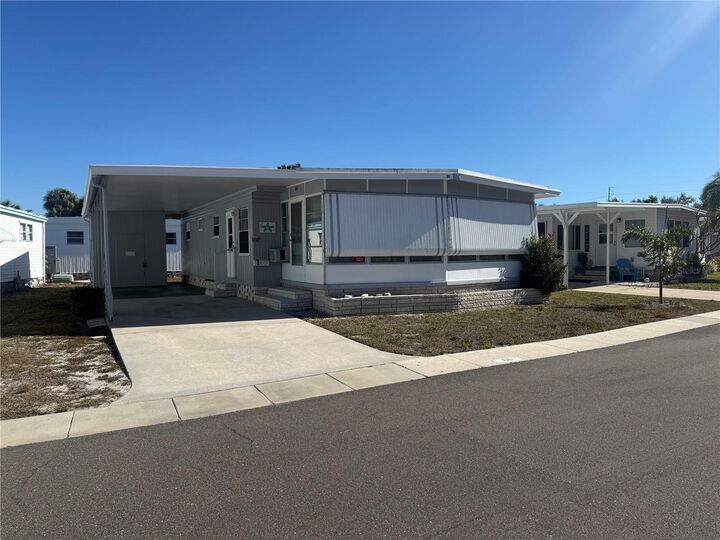 Property Photo:  7901 40th Avenue N 66  FL 33709 