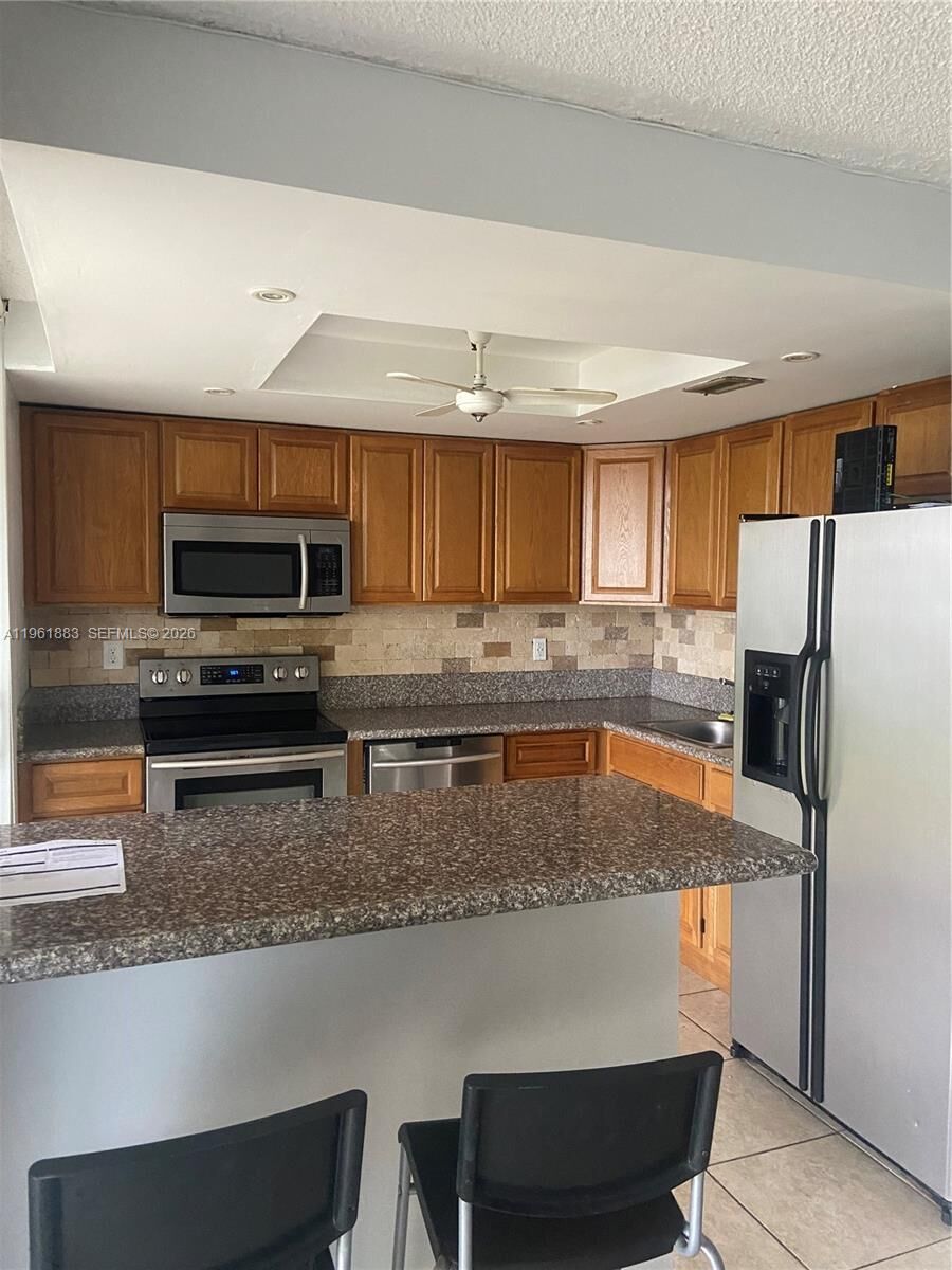 Property Photo:  665 NE 195th St 119  FL 33179 