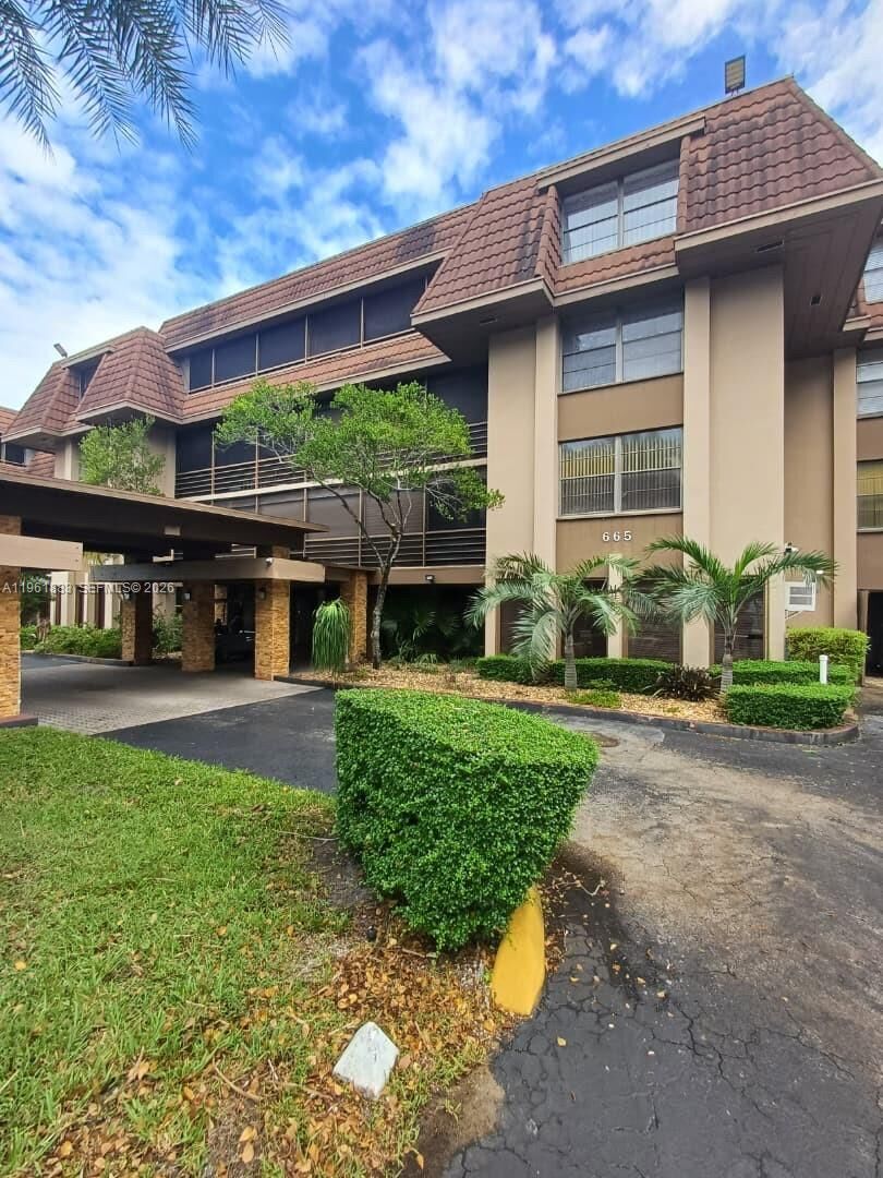 Property Photo:  665 NE 195th St 119  FL 33179 