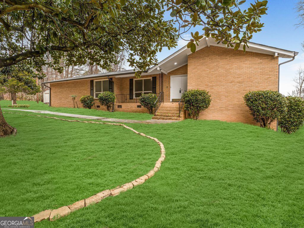 Property Photo:  247 Smithstone Path  GA 30214 