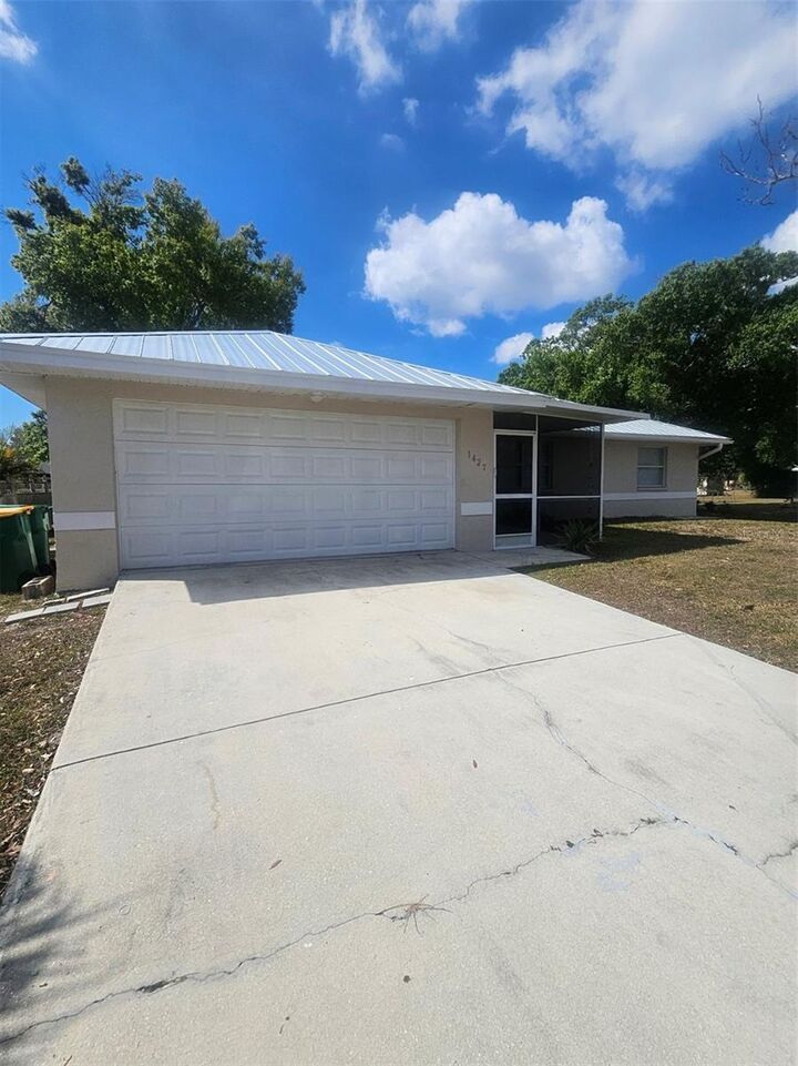 Property Photo: 1427 Hayworth Road FL 33952