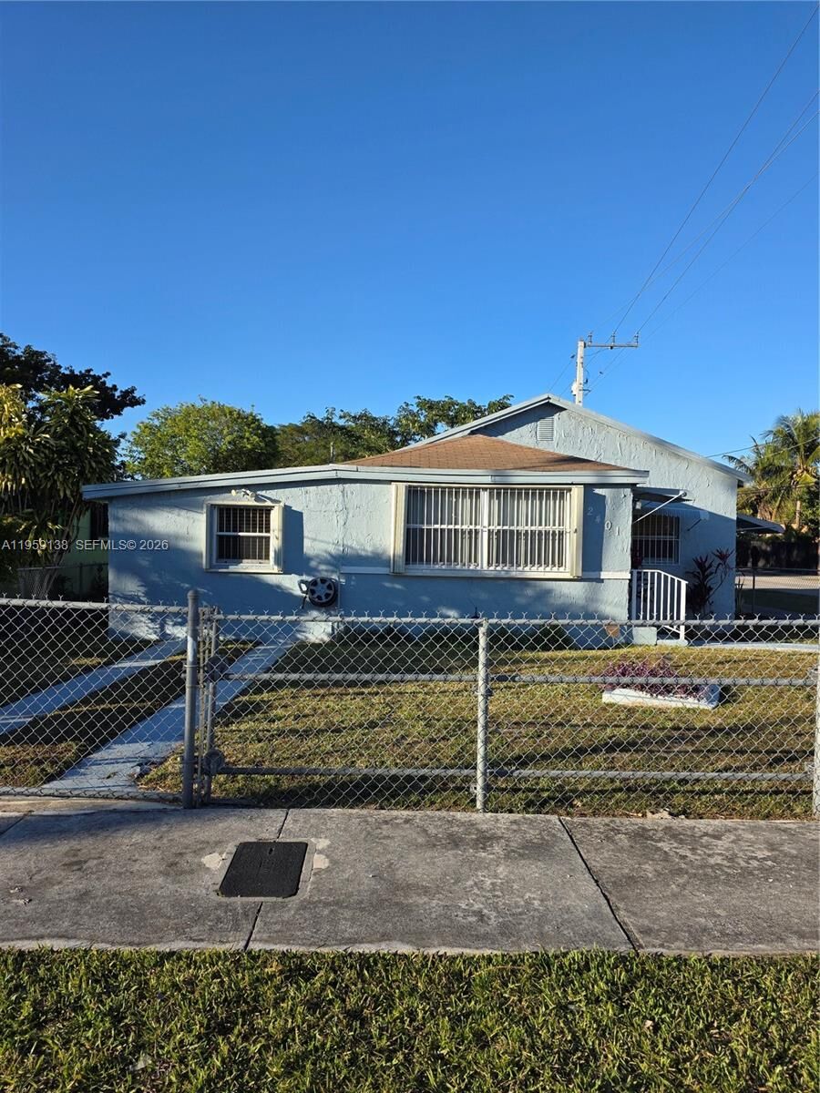 Property Photo:  2401 NW 56th St  FL 33142 