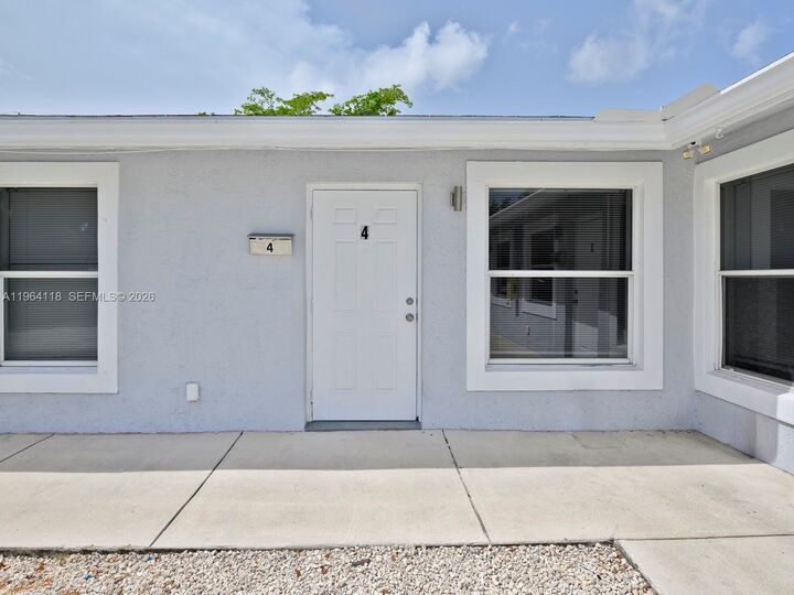 Property Photo:  241 NW 40th St 4  FL 33309 