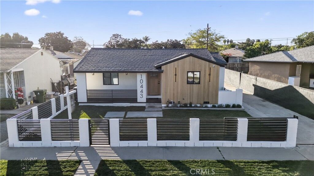 Property Photo: 10443 E Zamora Avenue CA 90002