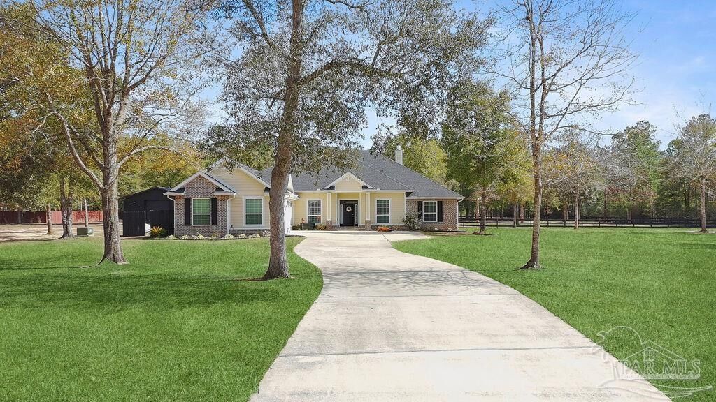 Property Photo:  6994 Foxboro Cir  FL 32571 