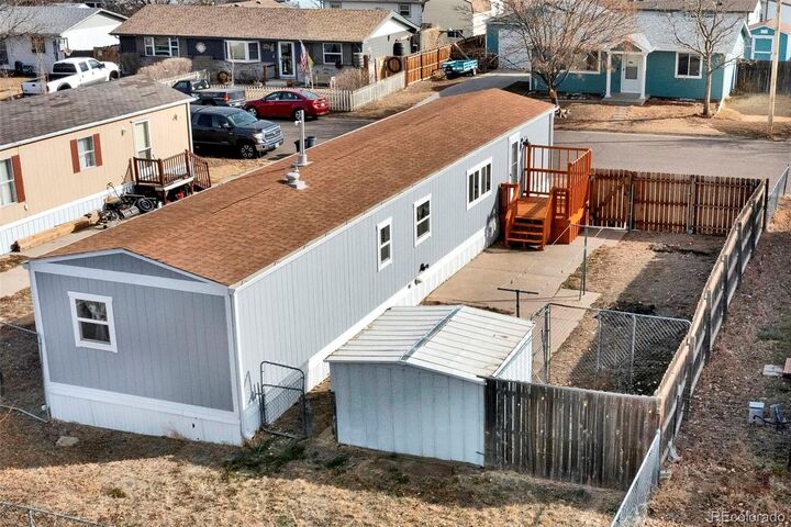 Property Photo:  231 Dahlia Street  CO 80102 