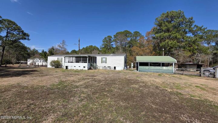 Property Photo: 16517 Village Green Drive N FL 32234