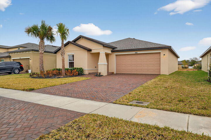 Property Photo:  748 Carlyle Way  FL 34947 