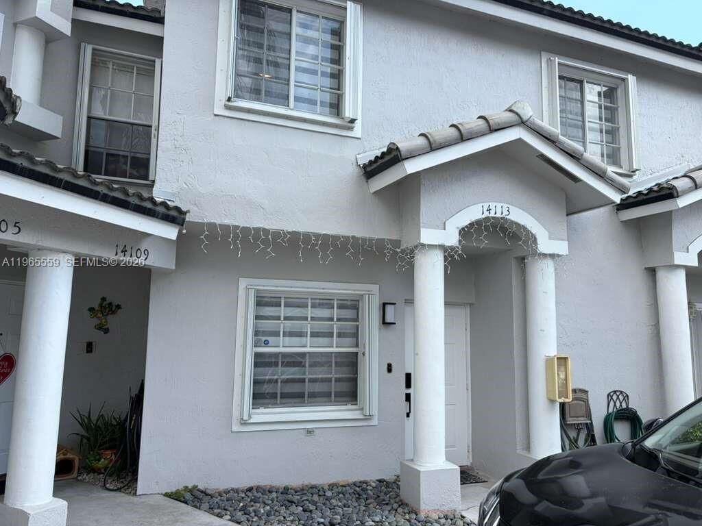 Property Photo:  14113 SW 120th Ct 4-16  FL 33186 