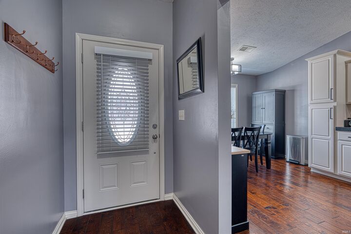 Property Photo:  9330 Hedgewood Court  IN 47725 