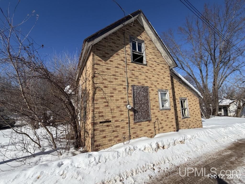 Property Photo:  412 4th 1/2 Alley  MI 49801 