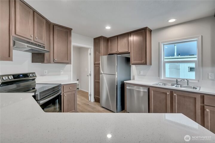 Property Photo: 18153 31st Avenue S 323 WA 98188