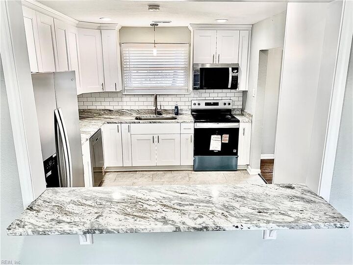 Property Photo:  8320 Mona Ave  VA 23518 