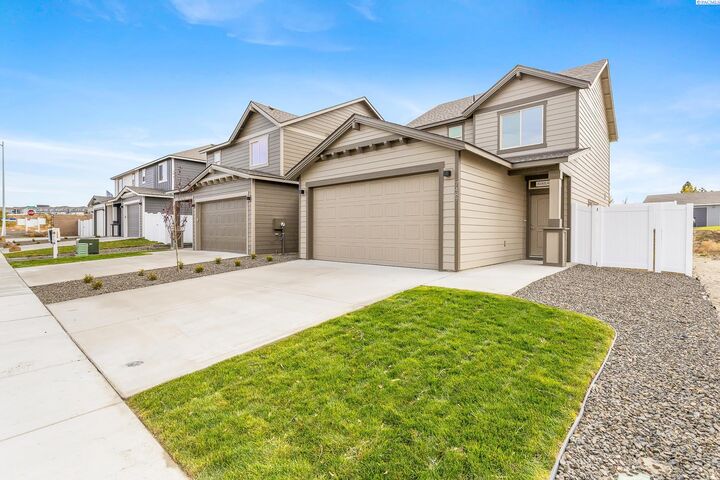 Property Photo:  7487 Grapevine Ct  WA 99353 