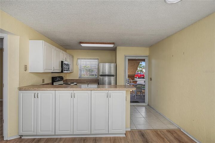 Property Photo:  25100 Sandhill Boulevard 102  FL 33983 