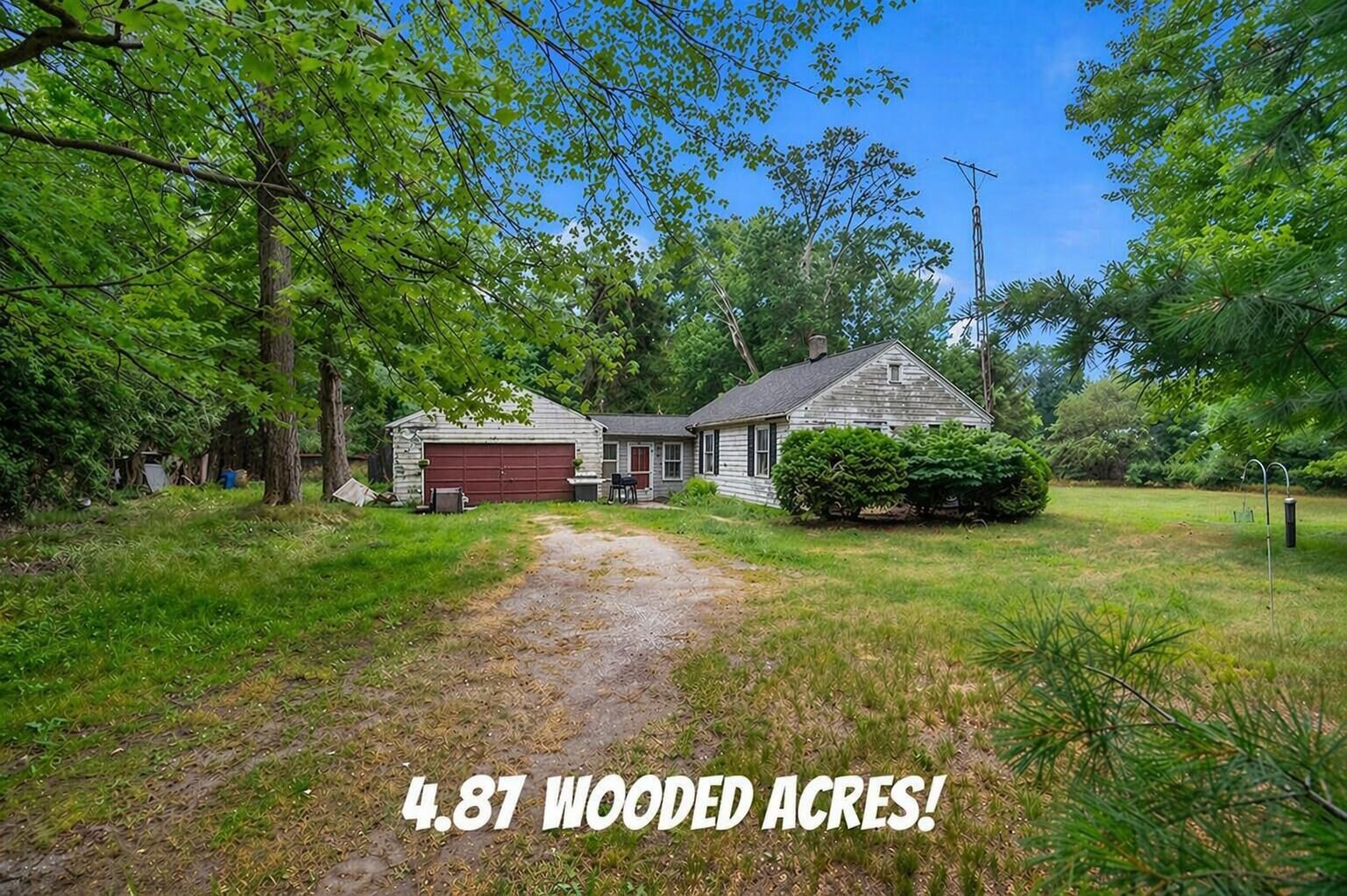 Property Photo:  1103 W Mt Garfield Road  MI 49441 