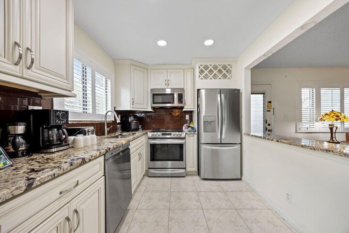 Property Photo:  15072 Ashland Place 124  FL 33484 