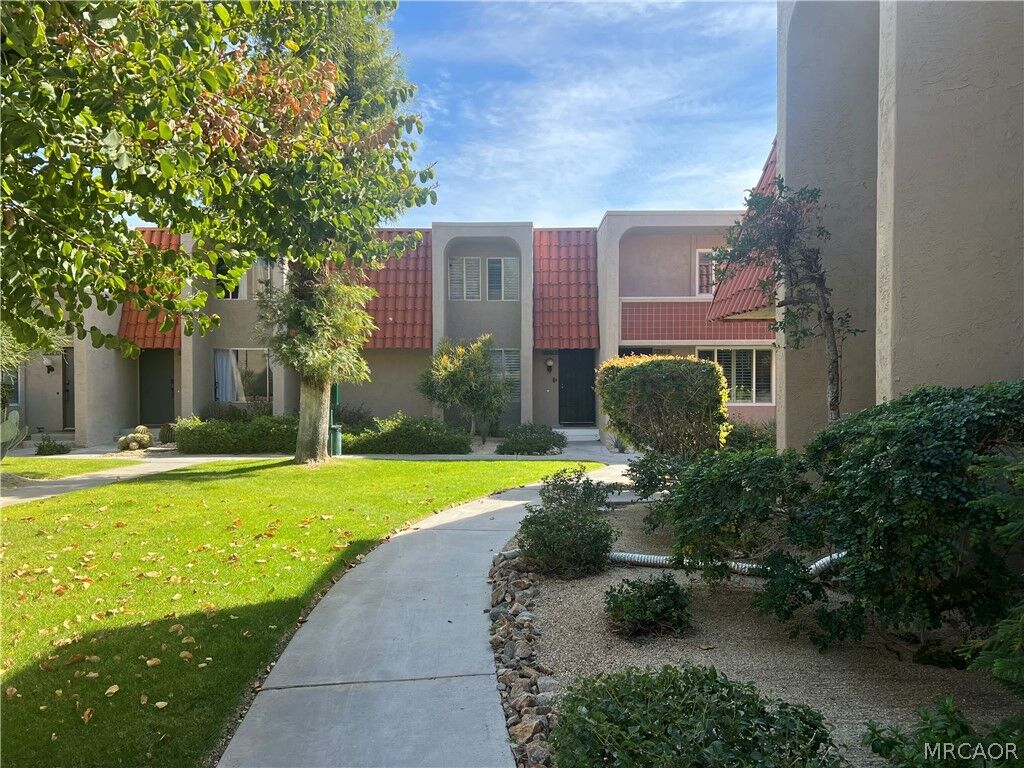 Property Photo:  232 E Via Escuela C  CA 92262 