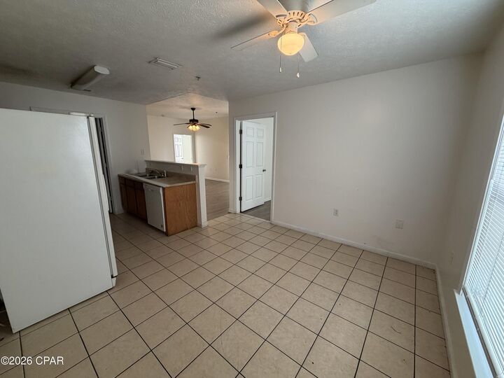 Property Photo:  9117 Laird Street 9119  FL 32408 