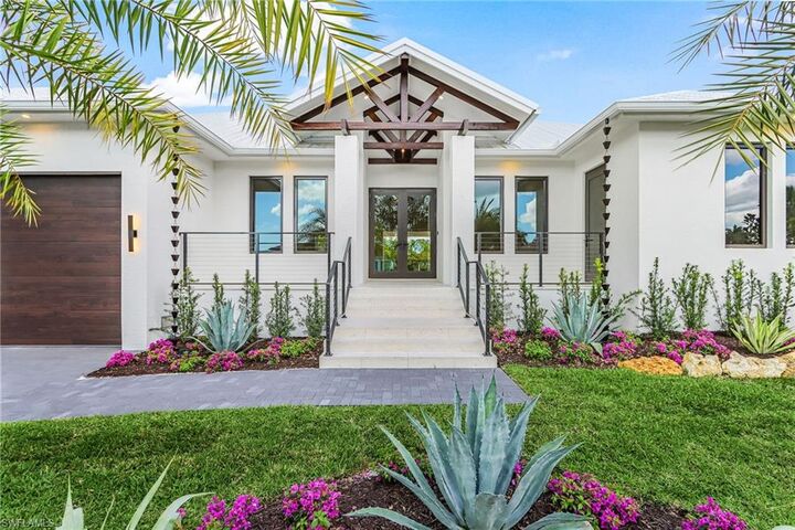 Property Photo: 2393 Longboat Dr FL 34104
