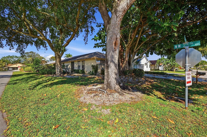 Property Photo:  2495 NW 14th Street  FL 33445 