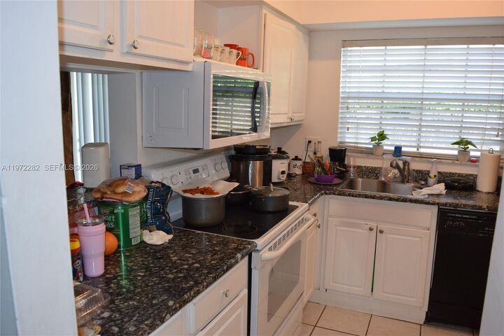 Property Photo:  2391 NW 96th Ter 19M  FL 33024 