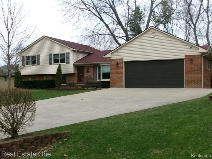 Property Photo:  23918 Forest Park Drive  MI 48374 3415 