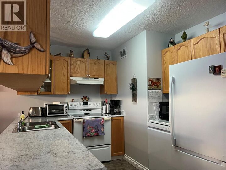 Property Photo: 10805 13 Street 215 BC V1G 4E5