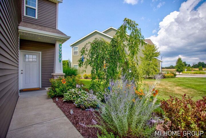 Property Photo: 11887 Quincy Meadow Drive MI 49424