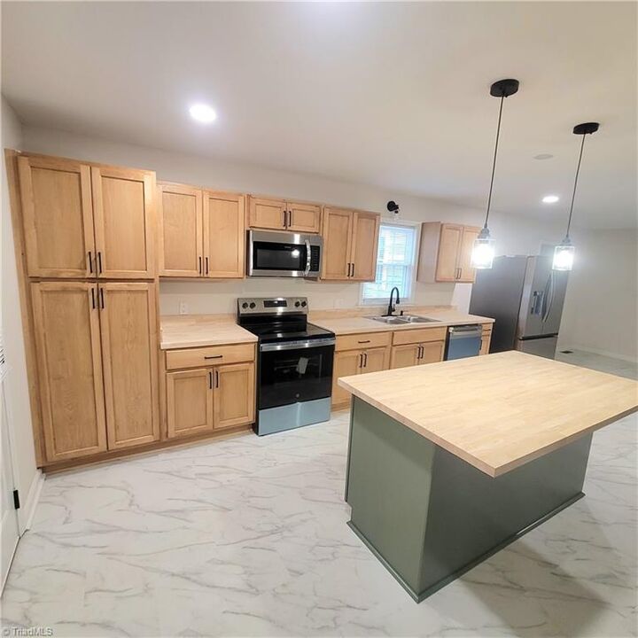 Property Photo:  1737 Amos Street  NC 27320 