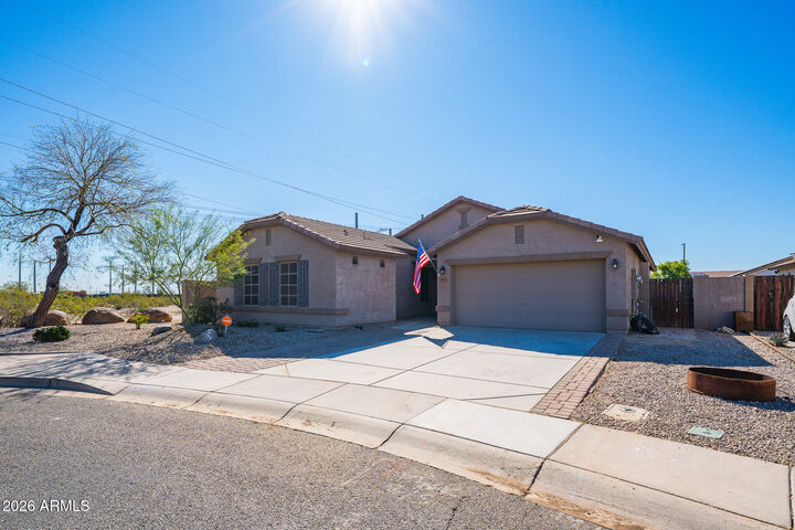 Property Photo: 25509 W Magnolia Street AZ 85326