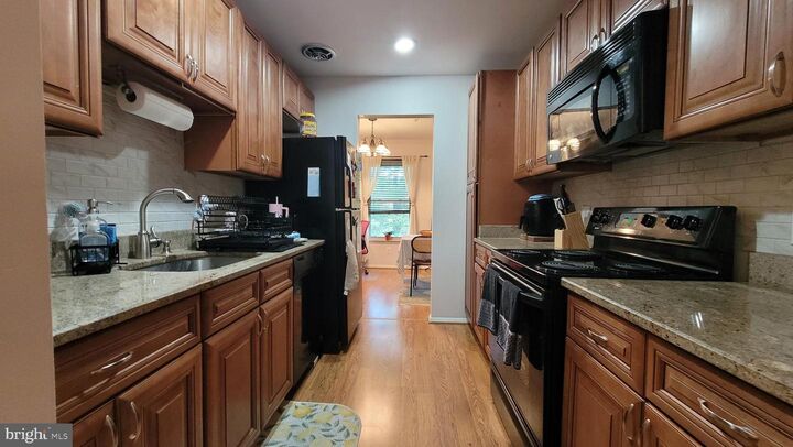 Property Photo:  7919 Coriander Drive 302  MD 20879 