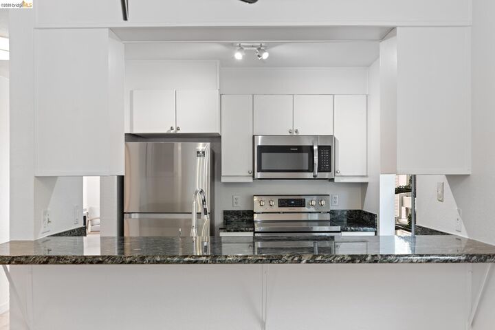 Property Photo:  3161 Birmingham Dr 209  CA 94806 