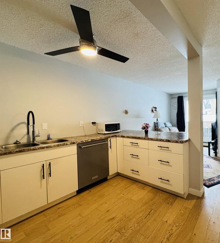 Property Photo: 10230 120 Street NW 105 AB T5K 2A3