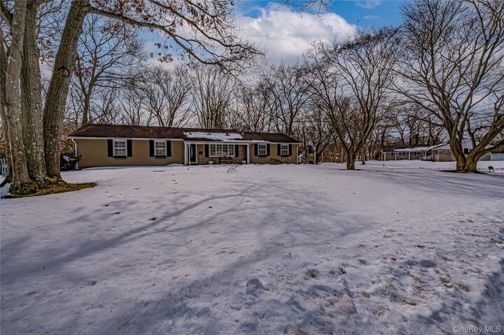 Property Photo:  9 Storybook Lane  NY 11780 