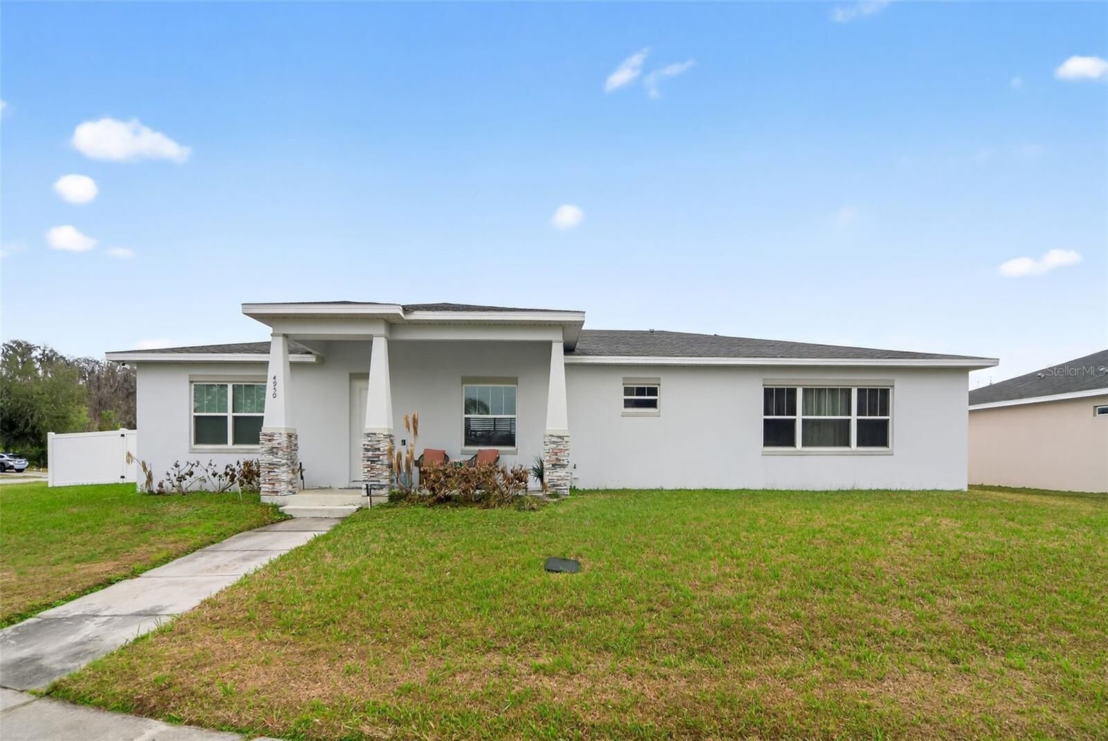 Property Photo: 4950 Pall Mall Street E FL 34758