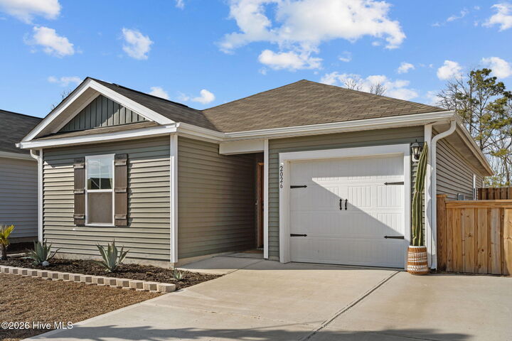 Property Photo:  2026 Course Lane  NC 28445 