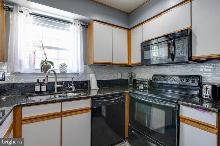 Property Photo:  8329 Founders Woods Way  MD 20744 