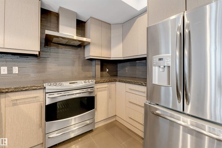 Property Photo:  10711 83 Avenue NW 102  AB T6E 2E5 