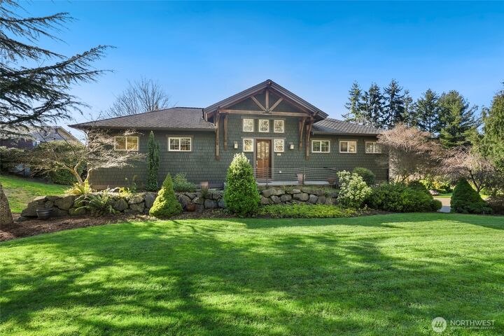 Home for sale in Olympia: 7011 Cooper Point Road NW, Olympia, WA 98502