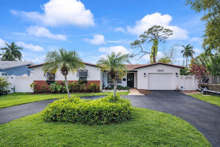 Property Photo:  1540 NE 47th Street  FL 33334 