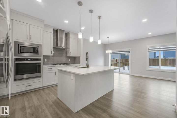 Property Photo:  9927 226 Street NW  AB T5T 7V2 