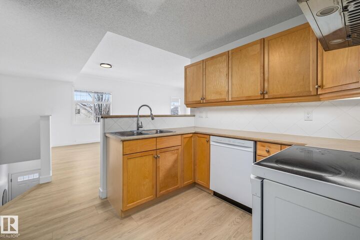 Property Photo:  1179 Summerside Drive SW 2  AB T6X 1K1 