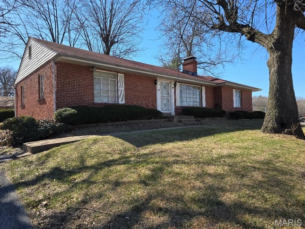 Property Photo:  7126 Forest Hill Drive  MO 63121 