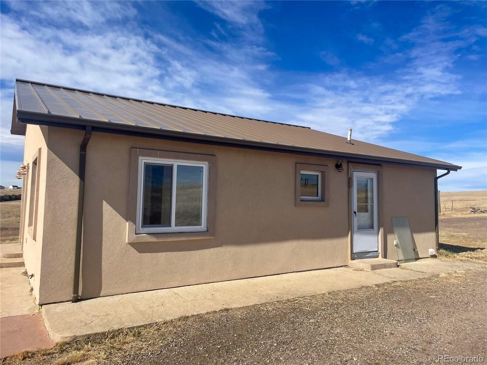 Property Photo: 45005 E Maplewood Drive CO 80102