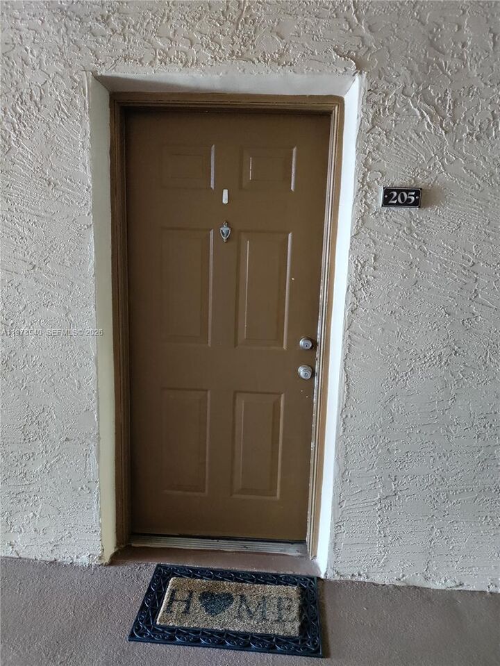 Property Photo:  215 SW 117th Ter 14205  FL 33025 