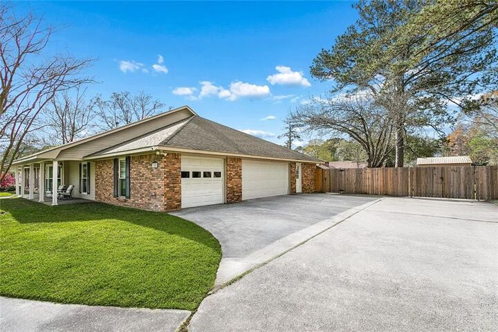 Property Photo:  125 Rue De La Paix Drive  LA 70461 